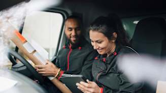 man-and-women-in-delivery-truck