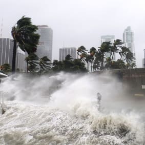 hurricane waves crash into wall