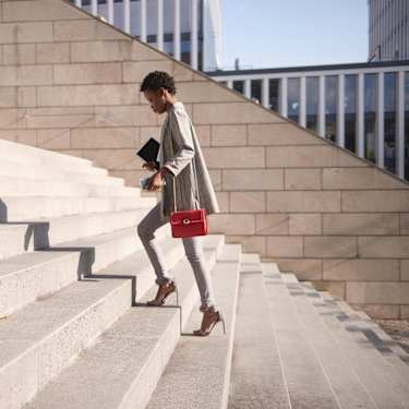 woman climbing stairs